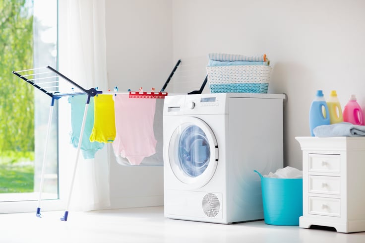 Canva - Laundry room with washing machine