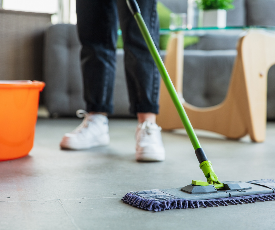 Cleaning the floor using essential cleaning tools and products